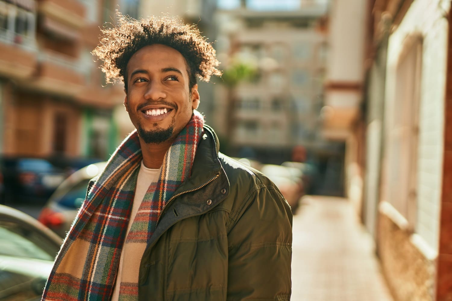 Man smiling happy standing at the city