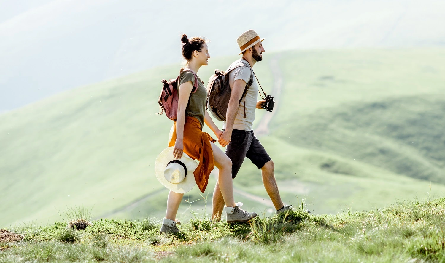 Happy couple enjoying a relaxing walk in the nature